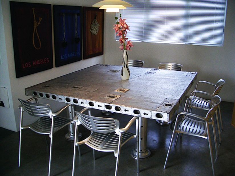 MotoArt creates all sorts of tables -- martini tables, coffee tables, conference tables -- from unexpected plane parts, including propellers.