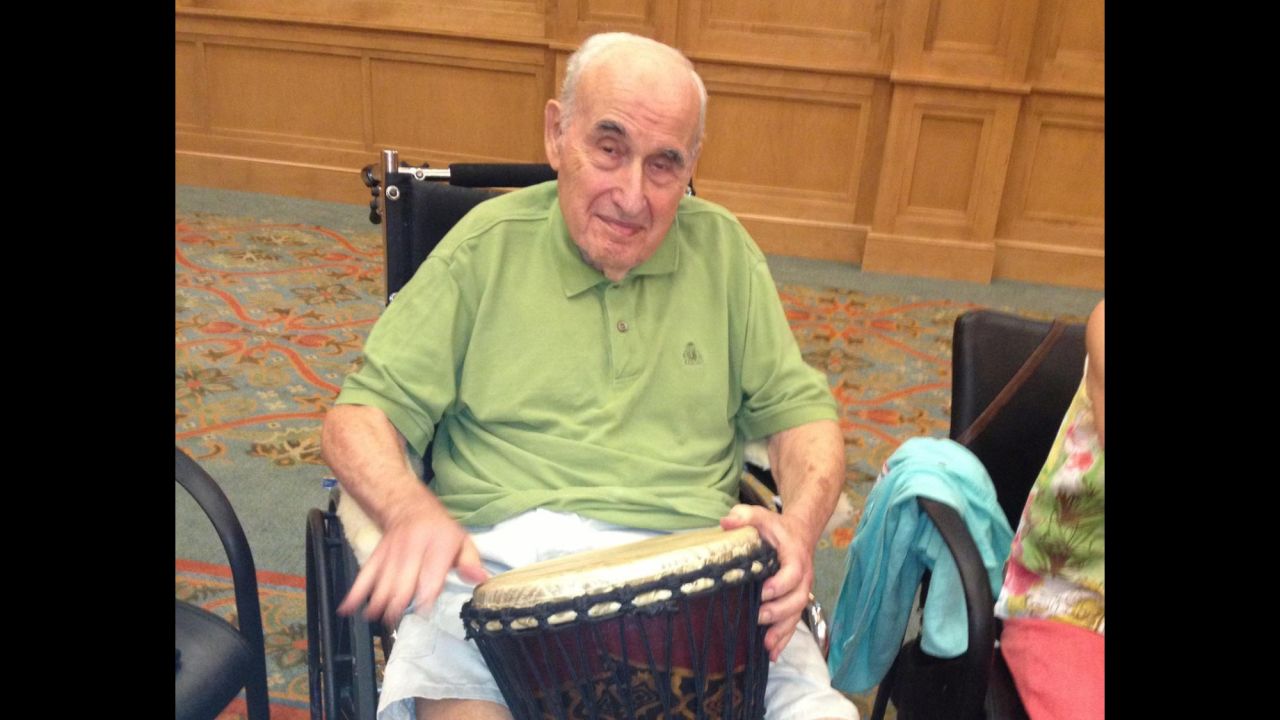 Dr. Sanford A. Shmerling, who has Alzheimer's, joined in drum circle activity recently at his nursing home in Atlanta.