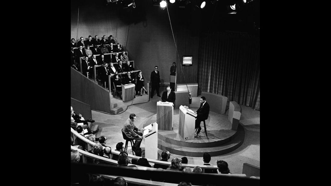 Moderator John McCaffery, left, segregationist editor James J. Kilpatrick and King debate segregation in New York on November 11, 1960.