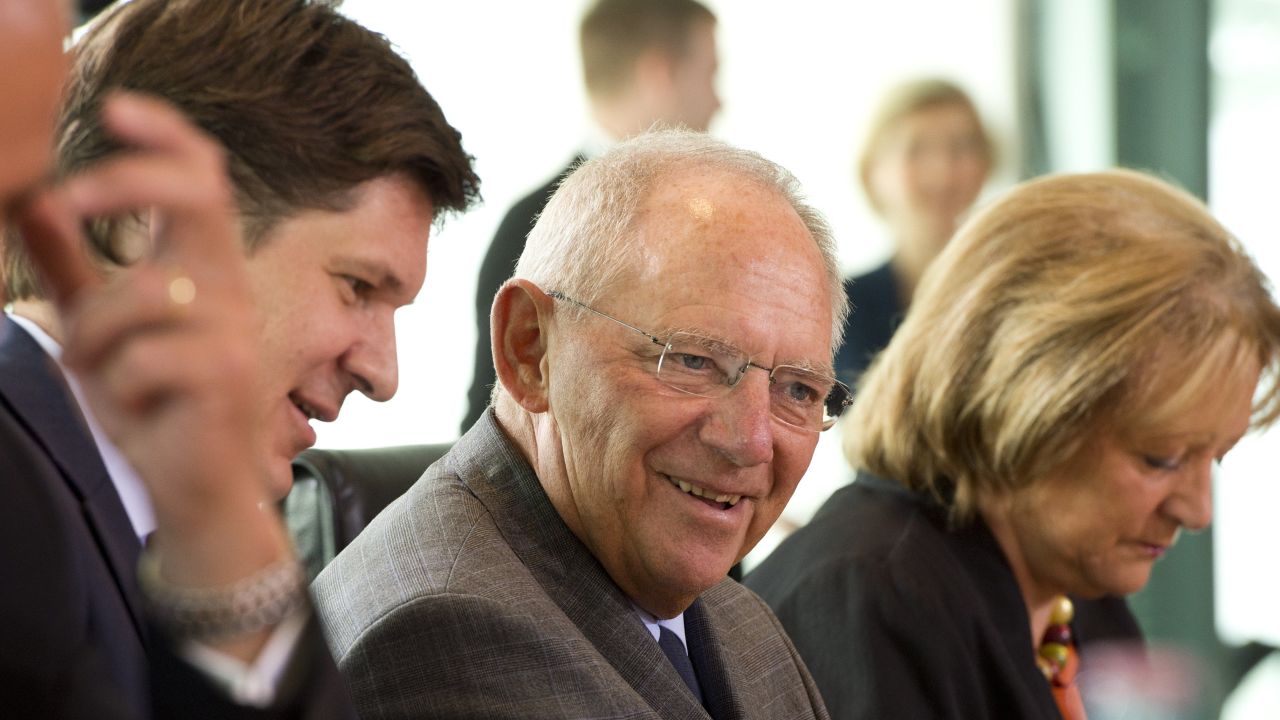 German Finance Minister Wolfgang Schaeuble (C) attends the German weekly cabinet meeting at the chancellery in Berlin on August 28, 2013