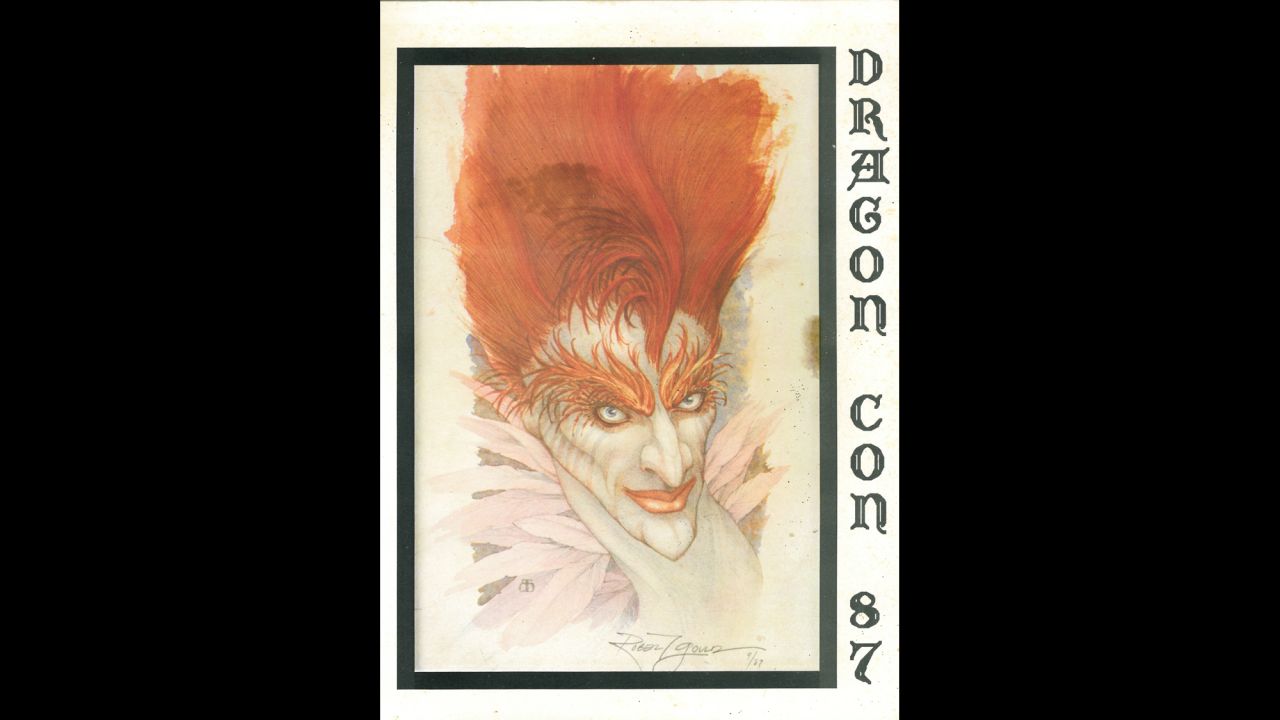 <a href="http://www.dragoncon.org/" target="_blank" target="_blank">Dragon Con</a> first opened its doors in 1987 to about 1,400 science-fiction and fantasy enthusiasts in an Atlanta hotel. This year's convention is expected to draw 55,000 fans. Each year, organizers publish a convention program with eye-catching cover art from a variety of sources: popular novels, comics and a few original illustrations. The first program from 1987 featured art by Robert Gould that was also used for the paperback cover of Michael Moorcock's novel "A Messiah at the End of Time."