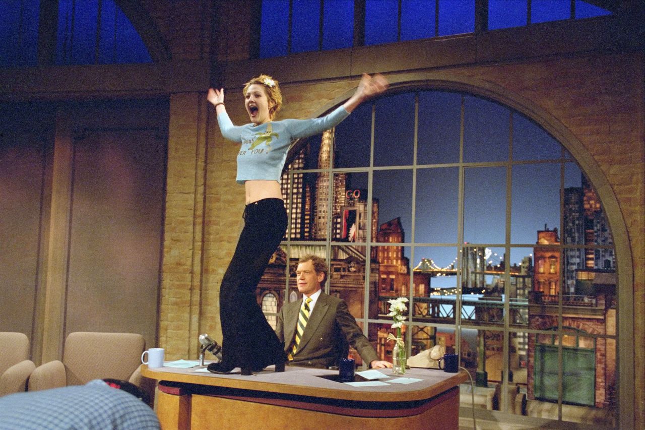 When Drew Barrymore showed up on "Letterman" in 1995, she came bearing gifts -- of a sort. The then-20-year-old actress was a ball of "good energy," and when talk turned to her interest in "nude performance dance," Letterman of course had to get a preview -- complete with flashing. It was his birthday, after all.