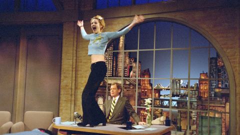 When Drew Barrymore showed up on "Letterman" in 1995, she came bearing gifts -- of a sort. The then-20-year-old actress was a ball of "good energy," and when talk turned to her interest in "nude performance dance," Letterman of course had to get a preview -- complete with flashing. It was his birthday, after all.