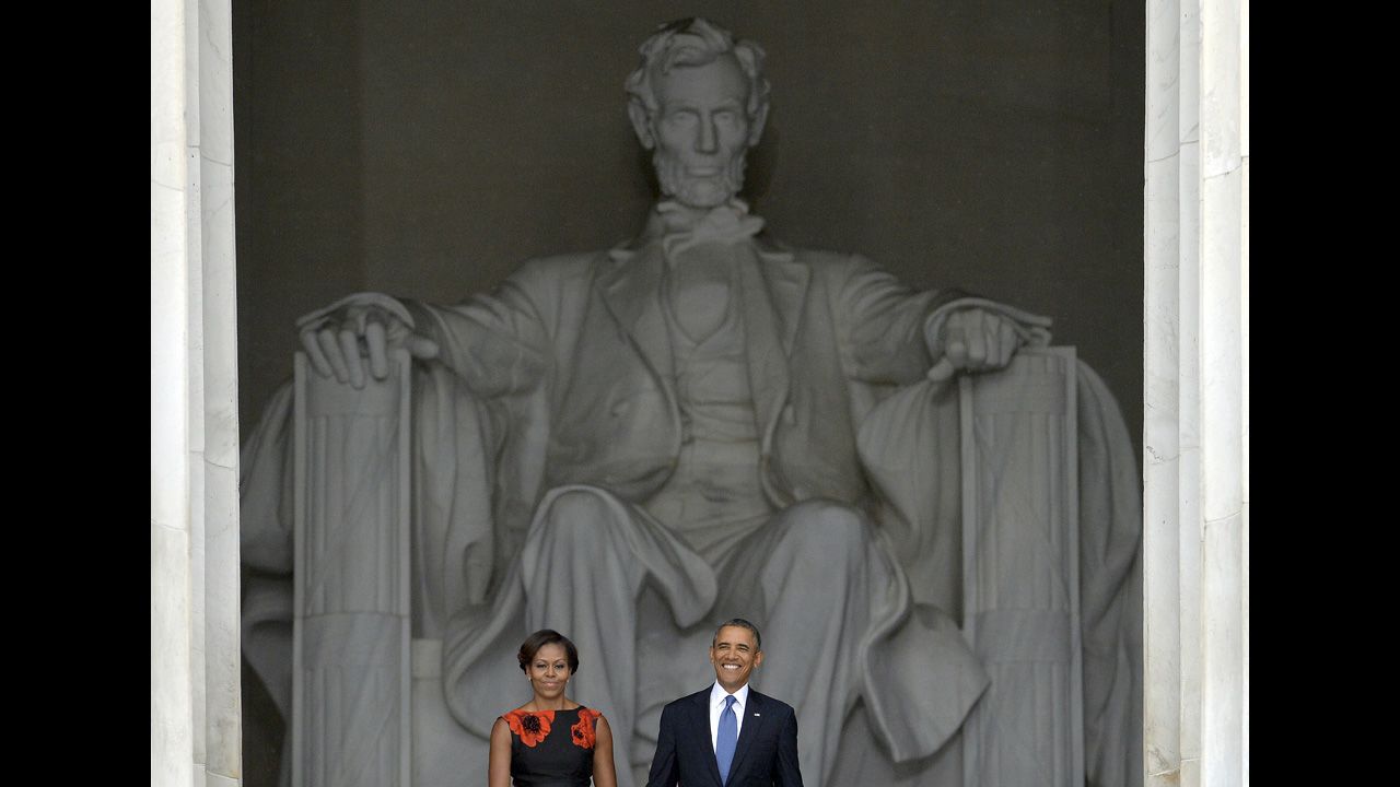 First lady Michelle Obama and President Barack Obama arrive at the Lincoln Memorial, where King spoke 50 years ago.