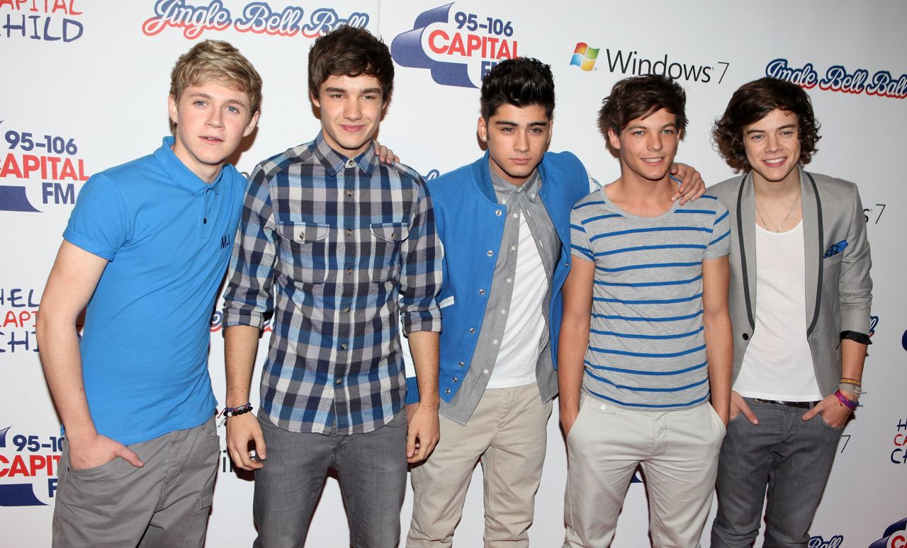 Which One Direction member recently purchased a house for his family?