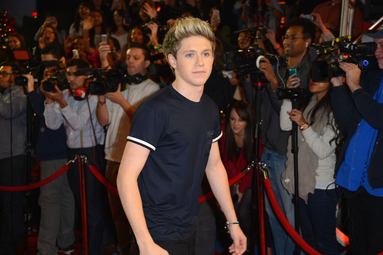 Niall Horan, who has retained his clean-cut image while the rest of the group continue to pack on the ink.