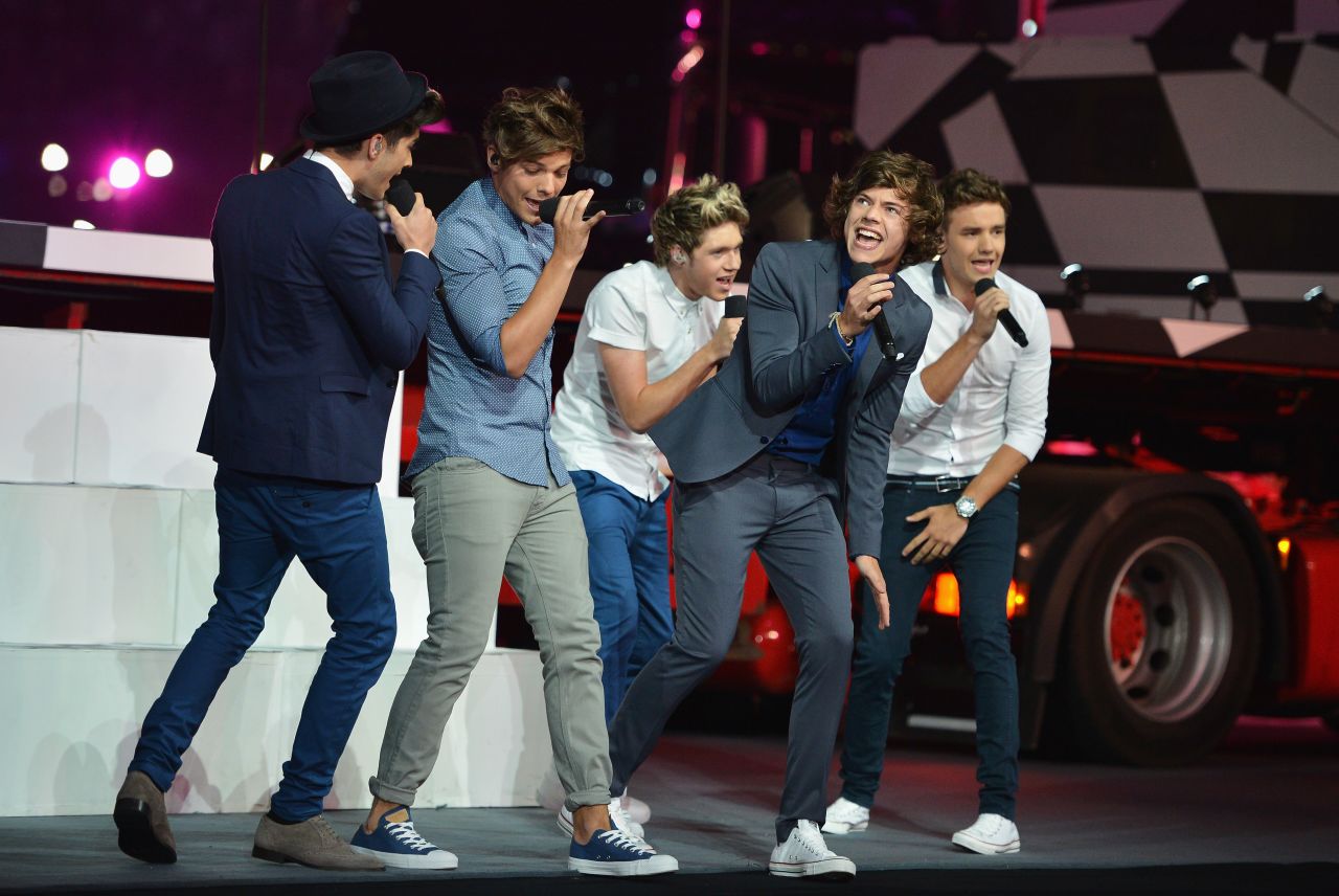 Which One Direction member says his favorite part of the group is being on the road with his mates?