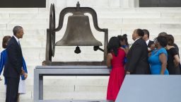 Members of the Rev. Martin Luther King, Jr's family ring a bell on Wednesday, August 28, as President Barack Obama watches, during the Let Freedom Ring Commemoration and Call to Action to commemorate the 50th anniversary of the March on Washington for Jobs and Freedom at the Lincoln Memorial in Washington.