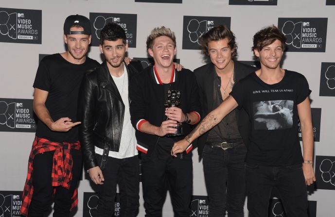 Which One Direction member recently got engaged?