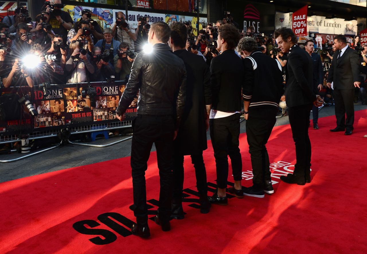 Which One Direction member hates the word "famous"?