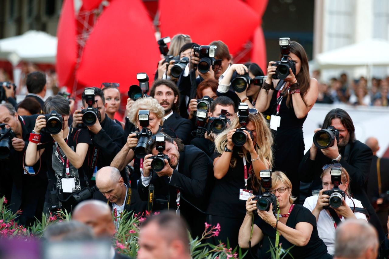 Photographers at the opening ceremony on August 28.