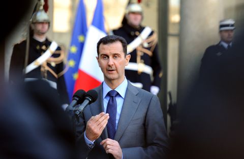 Al-Assad delivers a speech at Elysee Palace in Paris on December 9, 2010, after sharing a working lunch with his French counterpart, Nicolas Sarkozy, during a two-day official visit to France. 