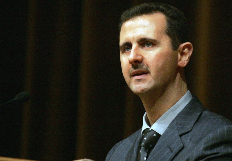 Al-Assad addresses the ruling Baath Party's 10th congress in Damascus on June 6, 2005.