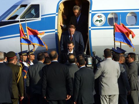 Al-Assad arrives at the airport in Sharm el-Sheikh, Egypt, on February 28, 2003.