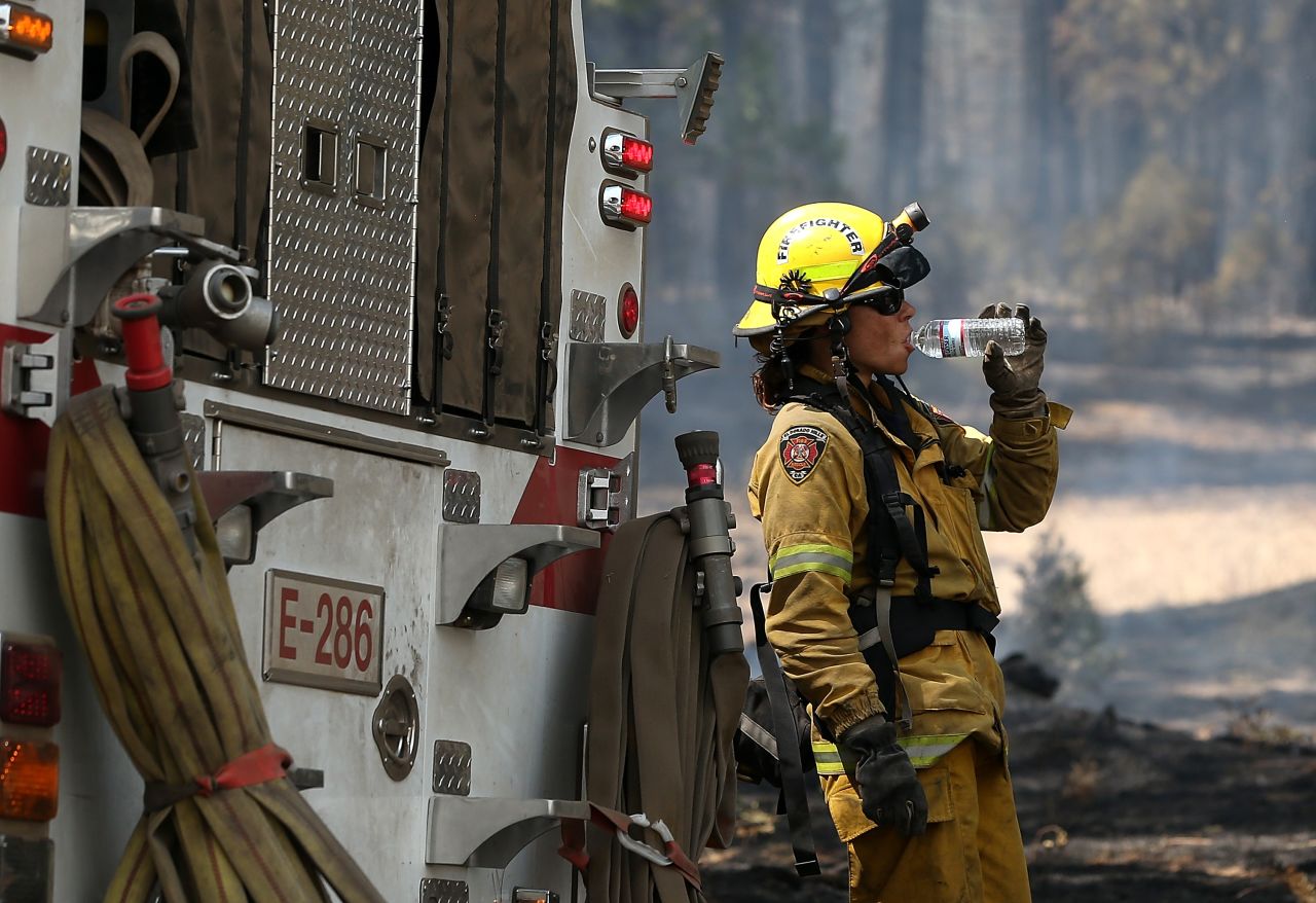 A firefighter takes a break from battling the Rim Fire near Groveland, California, on August 28. 