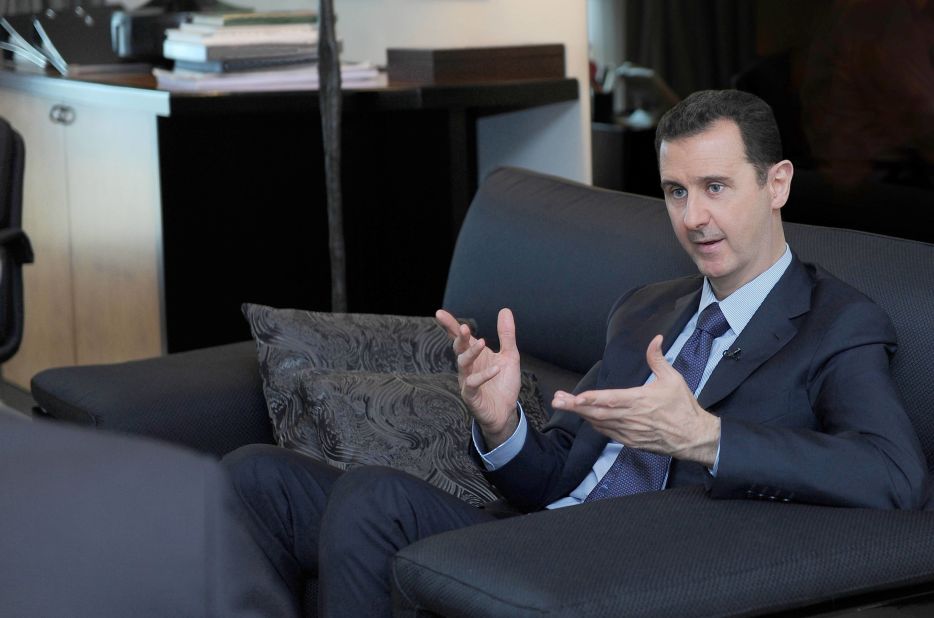 Al-Assad speaks with the Russian newspaper Izvestia in Damascus on August 26, 2013. He told the newspaper that Western accusations that the Syrian government used chemical weapons are an insult to common sense.