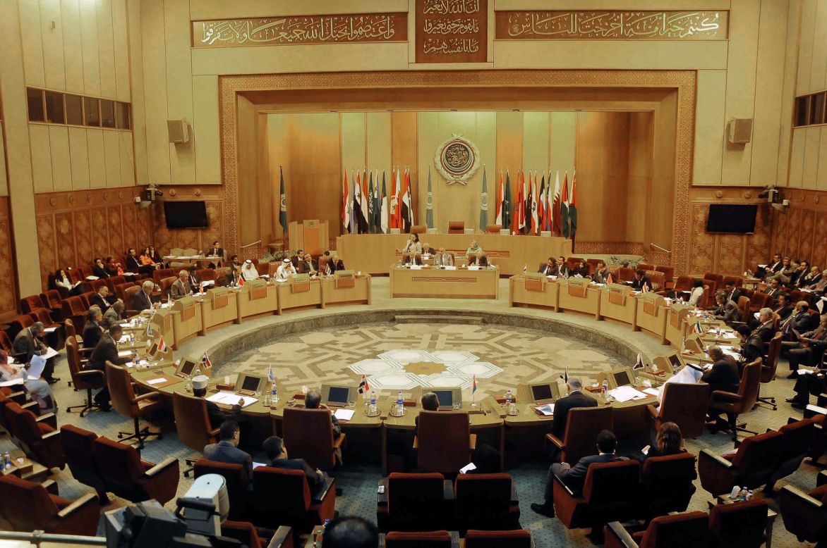 Representatives of Arab countries discuss Syria at the Arab League headquarters in Cairo, Egypt, on Tuesday, August 27. President al-Assad vowed to defend his country against any outside attack. "The threats of launching an aggression against Syria will increase its commitments," and "Syria will defend itself against any aggression," he said, according to Syrian state TV.