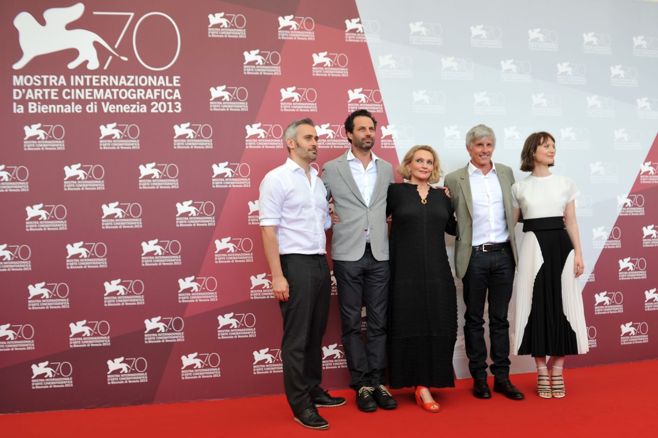 From left, producers Ian Canning and Emile Sherman, Australian writer Robyn Davidson, U.S. director John Curran and Australian actress Mia Wasikowska, pose during the photocall of "Tracks" on August 29.
