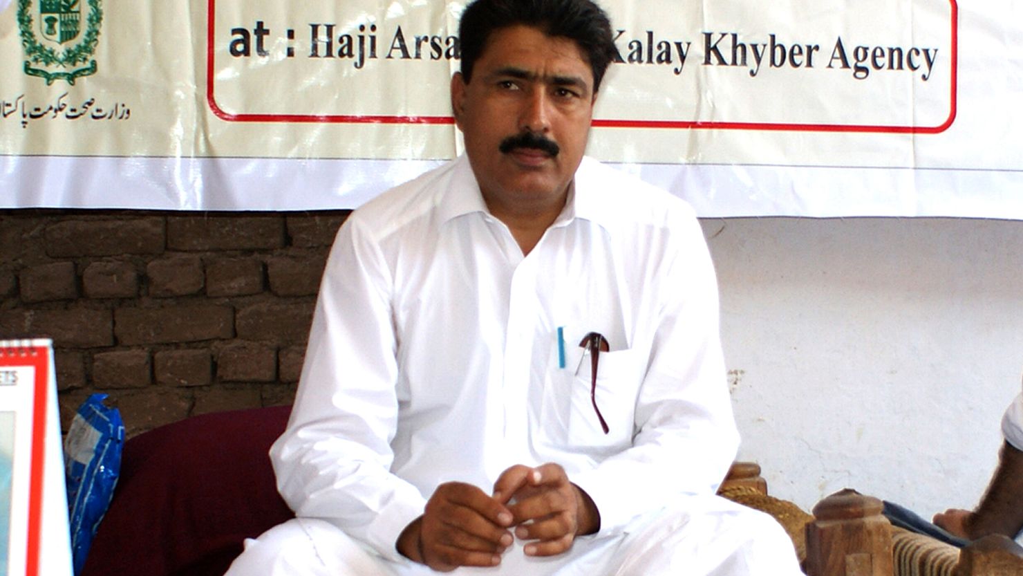 This photograph taken on July 22, 2010, shows Pakistani surgeon Shakeel Afridi, who was working for CIA to help find Osama bin Laden, attending a Malaria control campaign in Khyber tribal district. Pakistan's problematic relationship with the United States sailed into fresh controversy as US lawmakers warned of aid cuts after the jailing of a surgeon who helped the CIA hunt down Osama bin Laden. Shakeeel Afridi was found guilty of treason, sentenced to 33 years in prison and fined 320,000 rupees (3,500 USD) under an archaic tribal justice system that has governed Pakistan's semi-autonomous tribal belt since British rule. AFP PHOTO / MOHAMMAD RAUF (Photo credit should read MOHAMMAD RAUF/AFP/GettyImages)