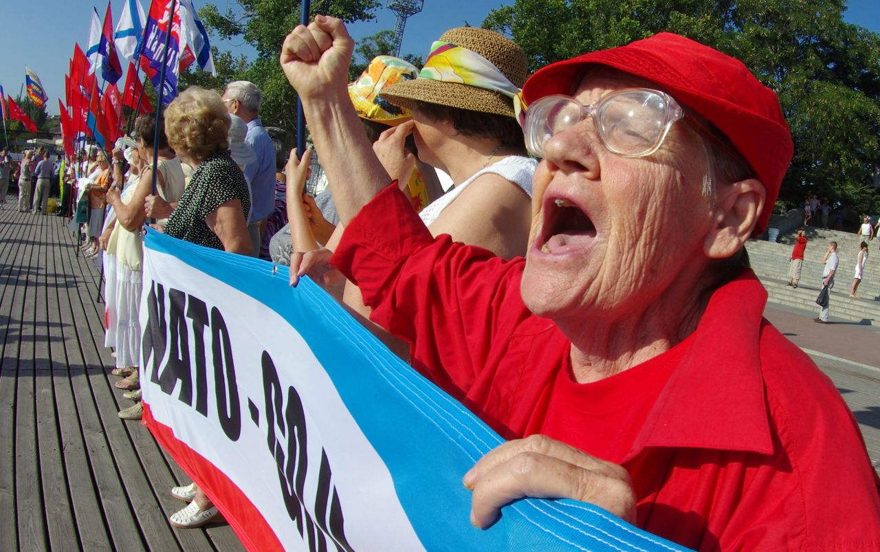A Ukrainian shouts anti-NATO slogans during a protest in support of the Syrian regime in Sevastopol, Ukraine, on August 29.