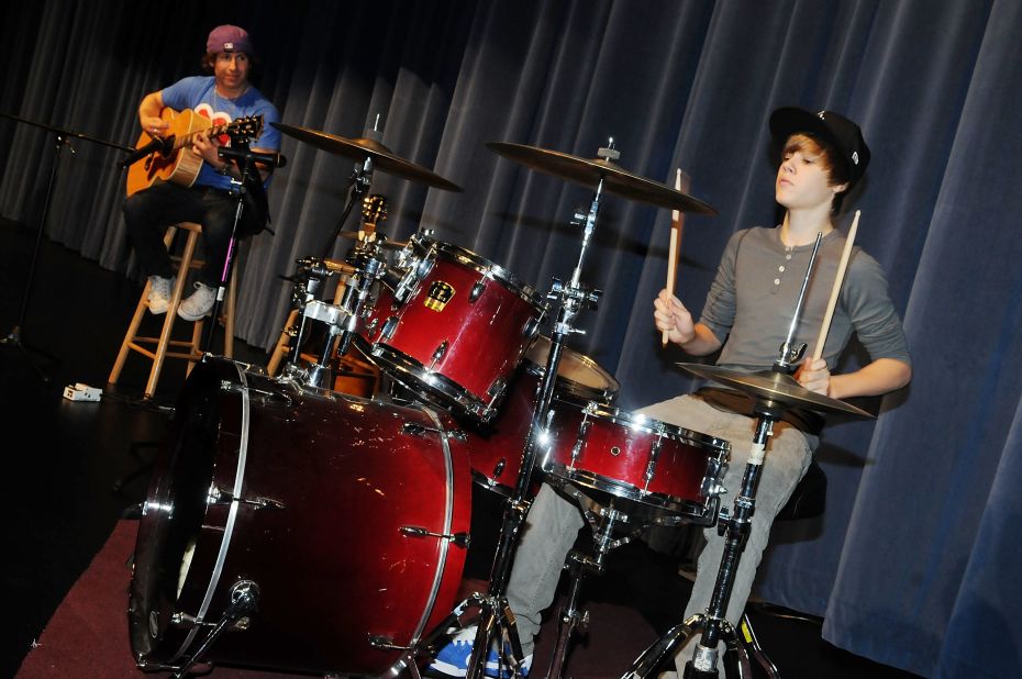 When Justin Bieber's mom gave him a drum kit for his second birthday, <a href="http://www.biography.com/people/justin-bieber-522504" target="_blank" target="_blank">he says he was "basically banging on everything" </a>he could get his hands on.