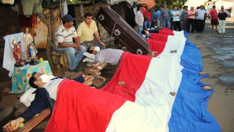 Eight bus drivers crucify themselves after getting fired in the city of Luque, Paraguay.