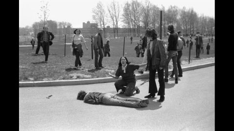 Mary Ann Vecchio screams as she kneels over Jeffrey Miller's body during an anti-war demonstration in 1970 at Kent State University. Student photographer John Filo captured the Pulitzer Prize-winning image after Ohio National Guardsmen fired into the crowd of protesters, killing four students and wounding nine others. A widely published version of the image was manipulated by an anonymous editor to remove the fence post above Vecchio's head, sparking a major controversy.