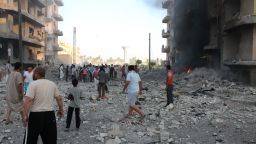 ac syria rubble ppl