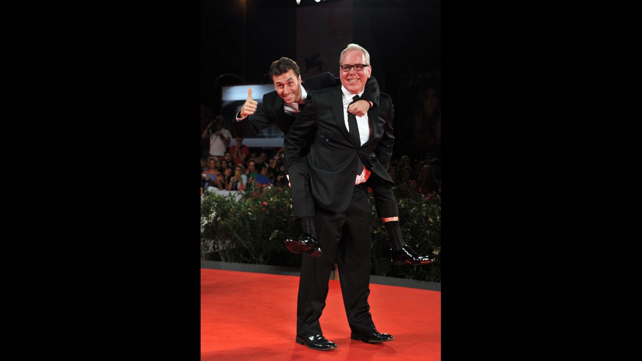 Actor James Deen gets a piggy-back ride from writer Bret Easton Ellis at "The Canyons" premiere on August 30.
