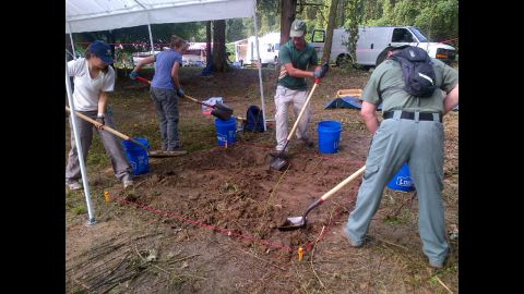 Anthropologists dig on the grounds of the former school in Marianna, Florida.