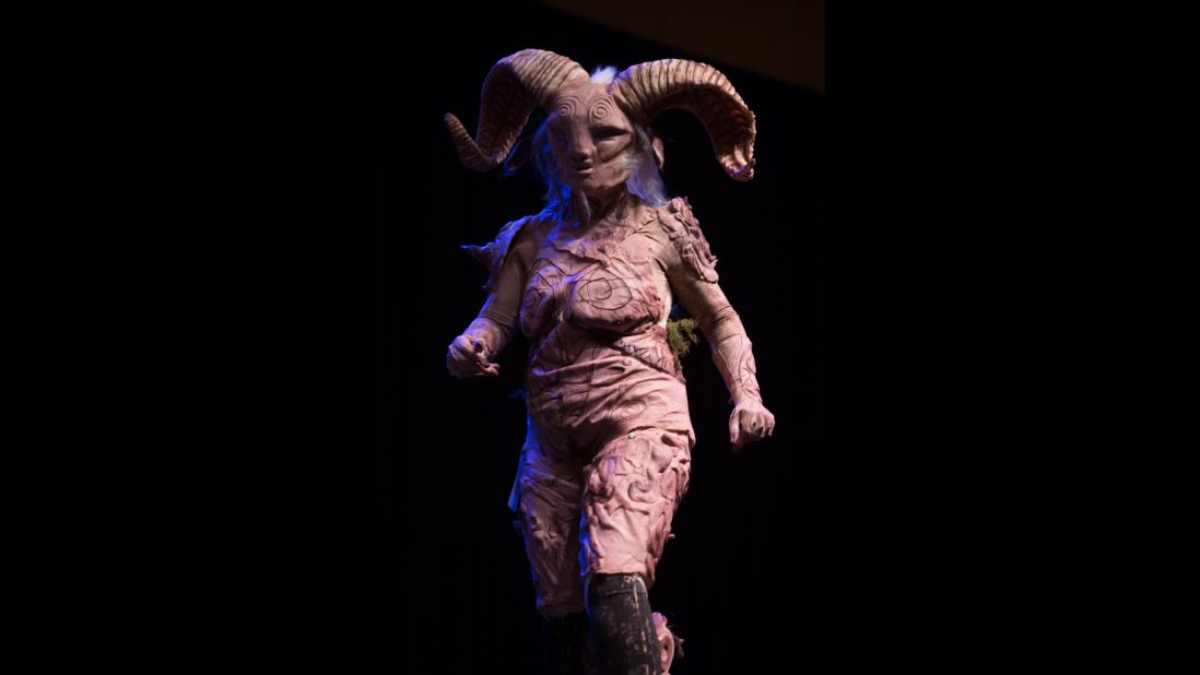 Alyssa Smith walks on stage as Fauno from the movie "Pan's Labyrinth." 