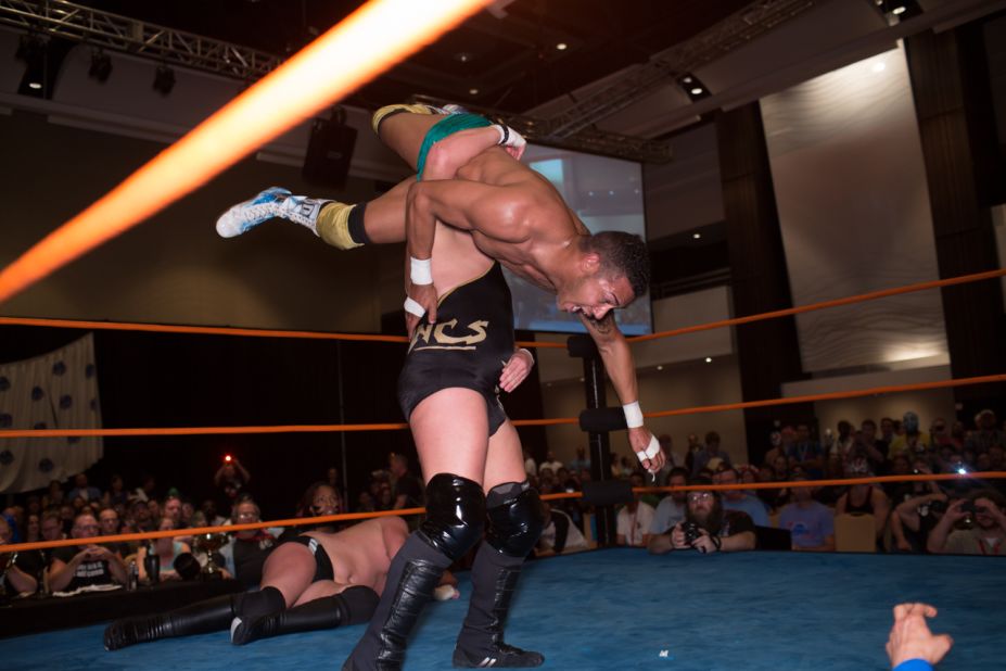 Wrestler Ethan Case body slams C.B. Suavé during one of the convention's most popular events. 