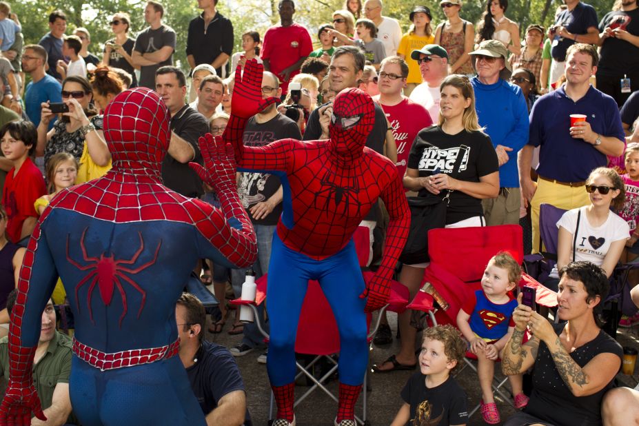 Two people dressed as Spider-Man high-five during the Dragon Con parade in downtown Atlanta on Saturday, August 31. The 27th annual sci-fi and fantasy convention is expected to draw more than 57,000 people.