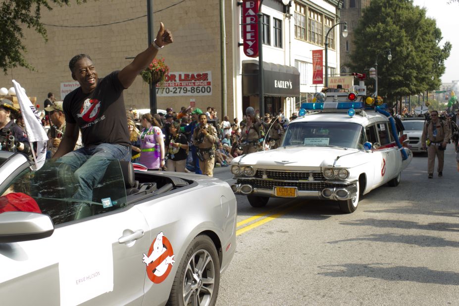 Actor Ernie Hudson, best known for his role in "Ghostbusters," rides along the parade route.