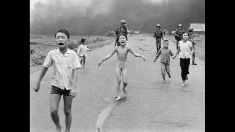 Associated Press photographer Nick Ut photographed terrified children running from the site of a napalm attack during the Vietnam War in 1972. A South Vietnamese plane accidentally dropped napalm on its own troops and civilians. Nine-year-old Kim Phuc, center, ripped off her burning clothes while fleeing. The image communicated the horrors of the war and contributed to the growing anti-war sentiment in the U.S. After taking the photograph, Ut took the children to a hospital in Saigon.