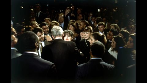 President Bill Clinton hugs Monica Lewinsky at a 1996 fund-raiser in Washington. At the time their relationship wasn't public, so the image fell into obscurity. But when the news of their affair broke, photographer Dirck Halstead recognized Lewinsky and recovered the photo from his archives. It eventually ran on the cover of Time magazine, and the Lewinsky scandal led to Clinton's impeachment.