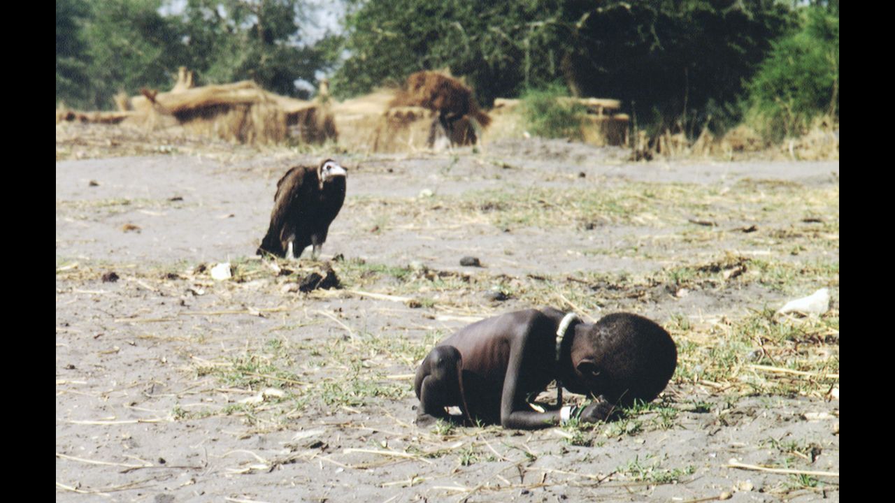 Kevin Carter's 1993 photograph of a starving child in southern Sudan brought him worldwide attention -- and criticism. Carter said the girl reached a nearby feeding center after he drove the vulture off, but questions persisted about why he didn't carry her there himself. Months after winning a Pulitzer Prize for the image, the South African photographer committed suicide. He was struggling with depression and coping with the recent death of his close friend and colleague Ken Oosterbroek.