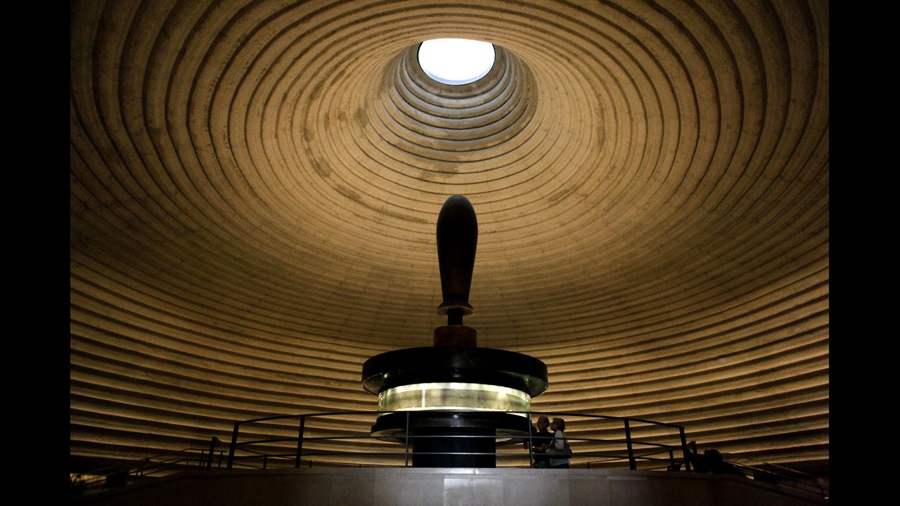 People look at the Isaiah Scroll, one of the Dead Sea Scrolls, in the vault of the Shrine of the Book at the Israel Museum. With more than 200 museums, Israel has the highest number of museums per capita in the world. Here is a <a href="http://travel.cnn.com/best-israel-museums-361281">list of 10 of the best</a>.