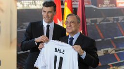 Gareth Bale and Real Madrid President Florentino Perez pose for photographers at the Berneabeu Stadium on Monday.