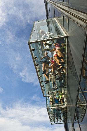 Visitors who step into one of the Ledge boxes at the Willis Tower in Chicago can see for 50 miles across four states. A protective coating on the glass cracked on Wednesday, May 28, but officials say visitors were never in danger. Click through this gallery to see more daring viewing platforms around the world: