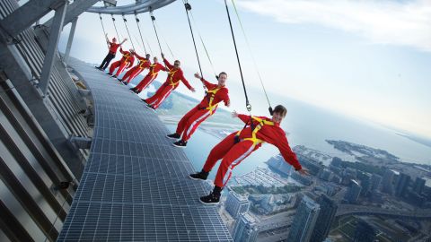The Edgewalk, located on the roof of the CN Tower's restaurant at a height of 1,168 feet (356 meters), allows visitors to slip into climbing harnesses and walk around the edge of Canada's tallest structure. 
There's also a glass floor 1,122 feet (342 meters) above ground level, and although this glass is only 2.5 inches thick, it's strong enough to hold 14 hippos -- if they could fit in the elevator.