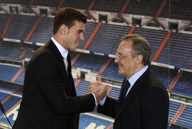 Florentino Perez (right) said Bale will "make the legend of the club greater and stronger" before adding: "This is your stadium, your shirt, your badge and your fans. From today this is your home."