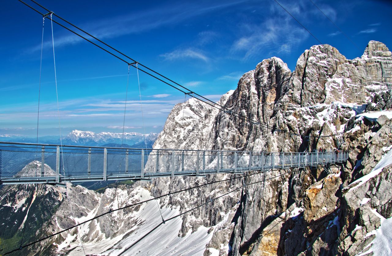 Visitors to the Dachstein Stairway to Nothingness must first cross Austria's highest bridge, which is 328 feet (100 meters) long and straddles a drop of 1,300 feet (396 meters). Then they face 14 steps that descend from the cliff face surrounded by glass walls. 