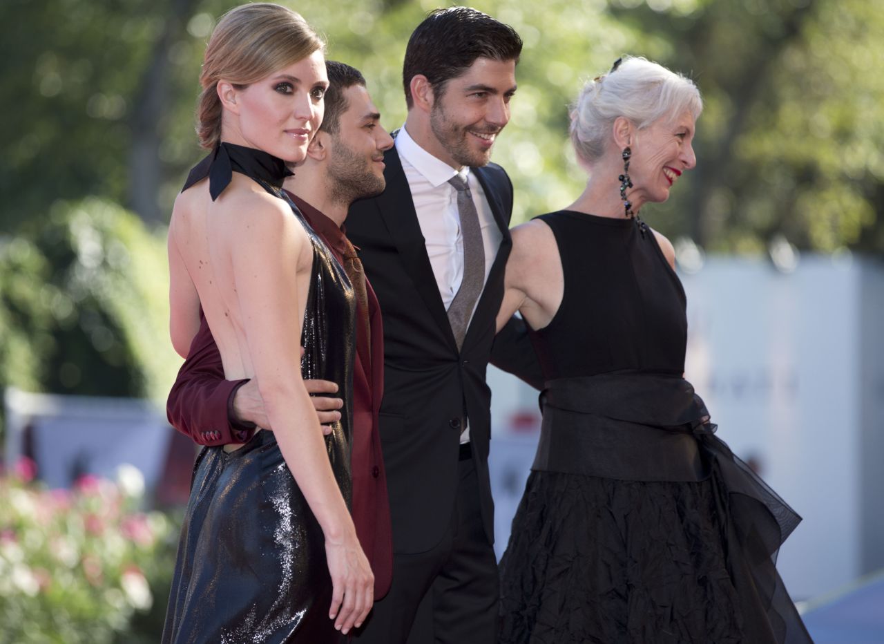 From left, actress Evelyne Brochu, director Xavier Dolan and actors Pierre Yves Cardinal and Lise Roy arrive for the screening of the movie "Tom at the Farm" at the Venice Film Festival on September 2.