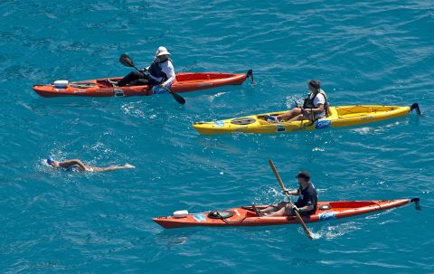 Nyad is escorted by kayakers two miles off the coast of Key West, Florida, on Monday, September 2.