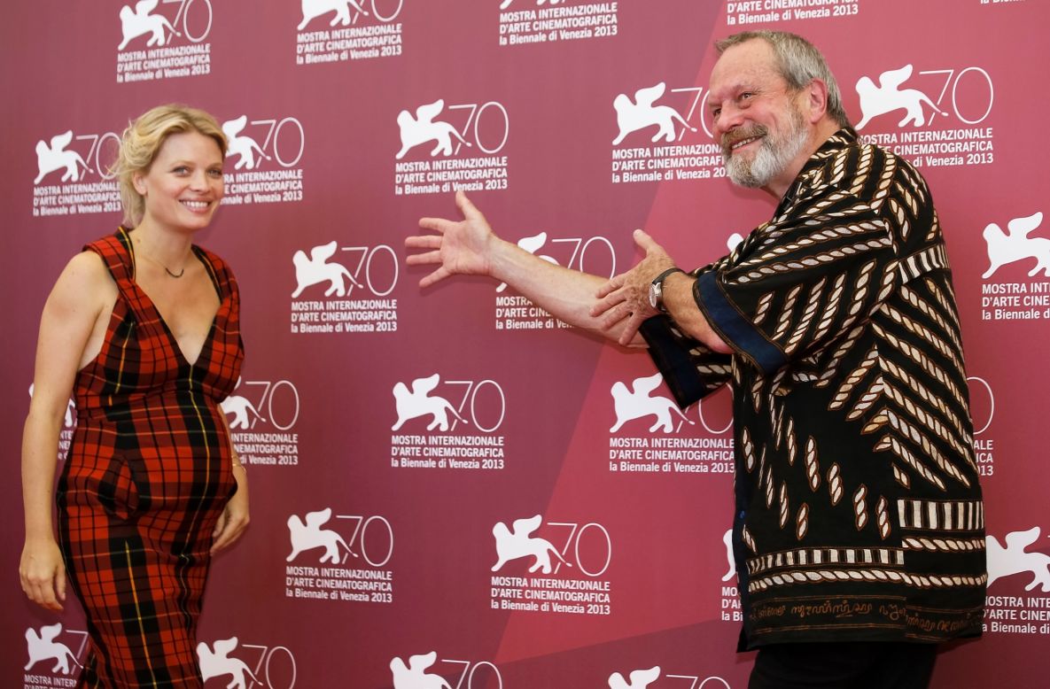 Actress Melanie Thierry, left, and director Terry Gilliam pose during the photo call for the film "The Zero Theorem" on September 2.