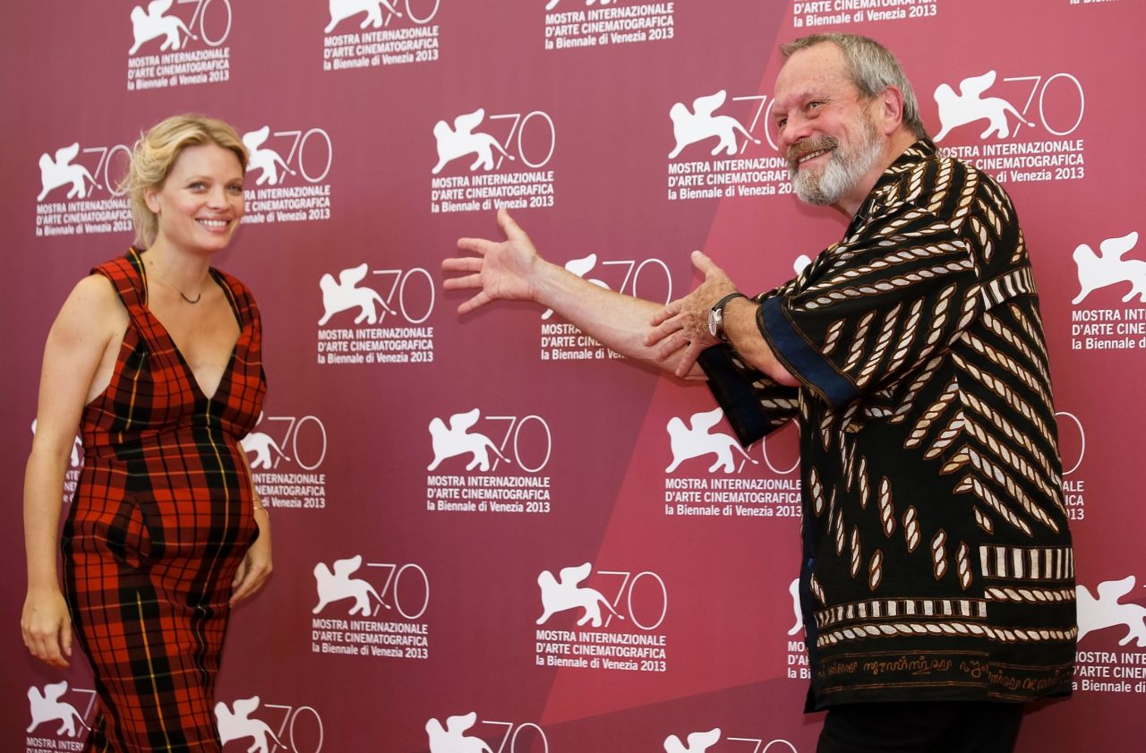 Actress Melanie Thierry, left, and director Terry Gilliam pose during the photo call for the film "The Zero Theorem" on September 2.