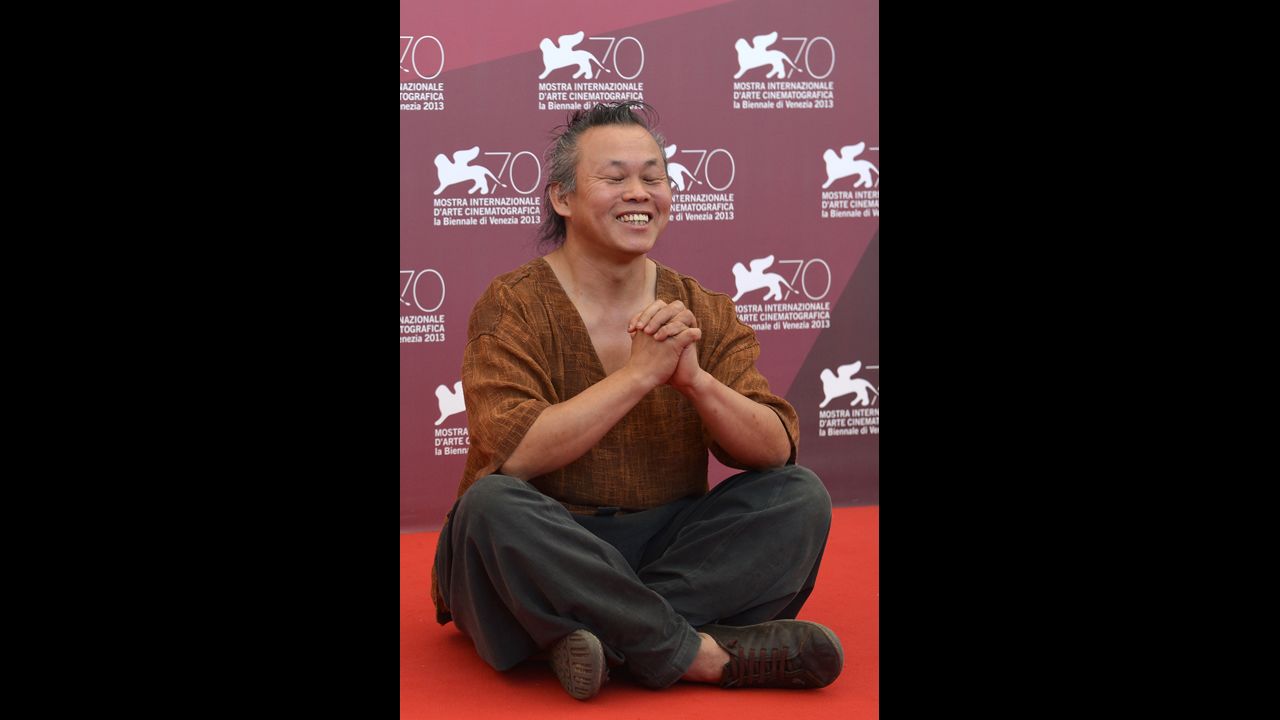 South Korean director Kim Ki-duk poses during a photo call for "Moebius," presented out of competition on September 3.