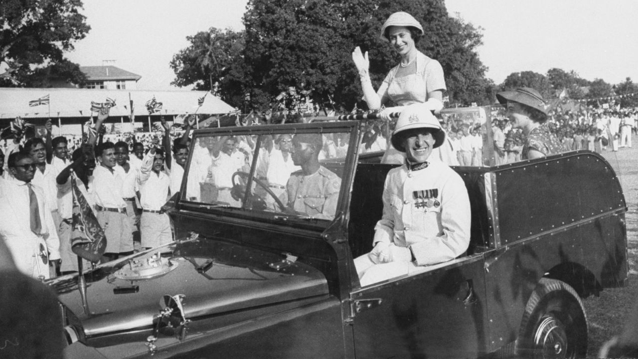 Princess Margaret waves to a crowd during her tour of East Africa on September 1, 1956.
