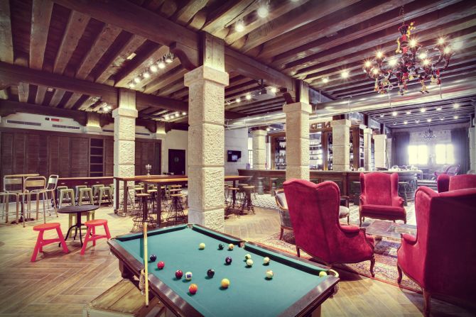 This high-style hostel has loads of character and plenty of history -- with original wooden beams, worn metals and cozy seating. 